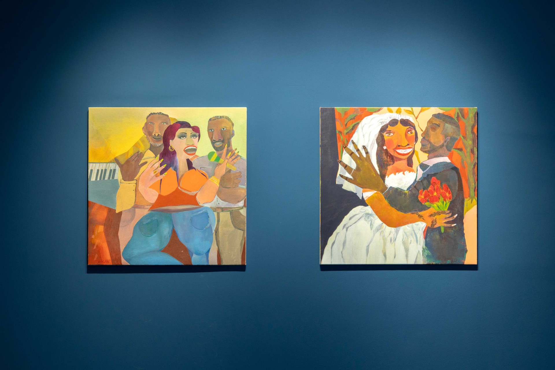 Two colorful paintings: one depicts a singing woman, the other a bridal couple with flowers.