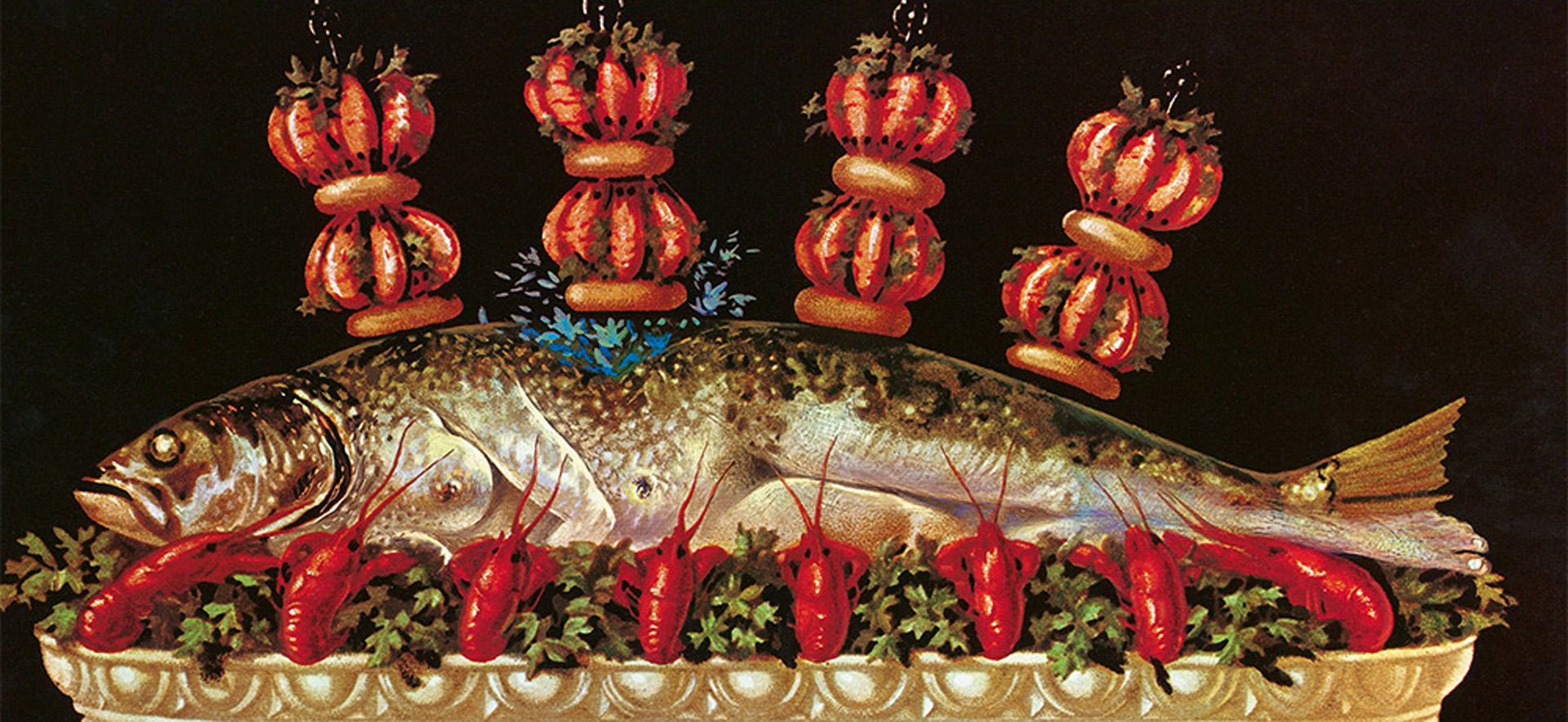 A large fish dish with crayfish, garnished with red tomatoes and fresh herbs on an elegant platter.